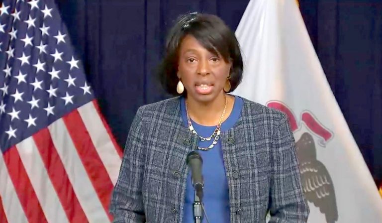 Dr. Ngozi Ezike, diretor of the Illinois Department of Public Health, announces during a news conference Thursday in Chicago that there were 1,527 new confirmed cases of COVID-19 recorded in the state the past day along with 104 additional deaths. (Credit: blueroomstream.com)