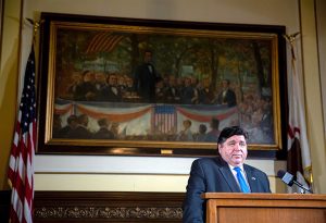 Gov. JB Pritzker addresses the media Friday during a news conference in his Capitol office in