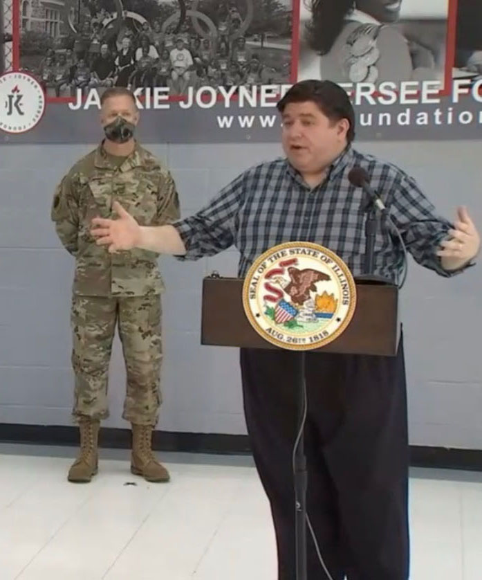 Gov. JB Pritzker answers reporters' questions during his daily COVID-19 press briefing Wednesday at the Jackie Joyner-Kersee Center in East St. Louis. (Credit: blueroomstream.com)