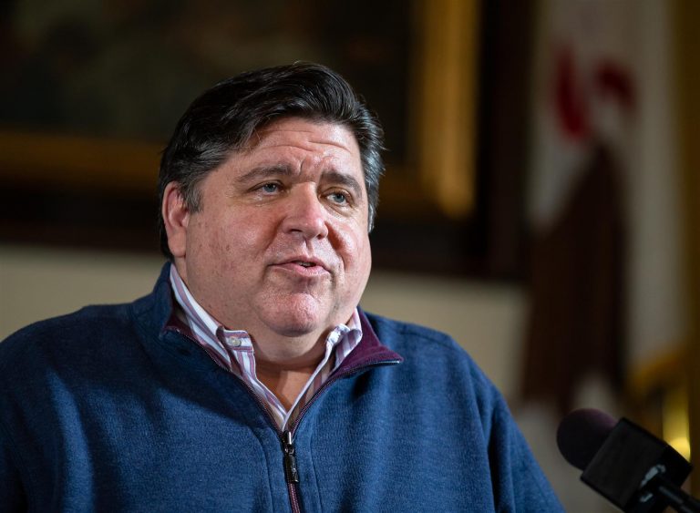 Gov. JB Pritzker answers reporters' questions during a news conference May 21 in his office at the Capitol in Springfield. Pritzker on Thursday said religious services will be allowed beginning Friday despite guidelines requiring public gatherings be limited to 10 or fewer people when Phase 3 of his reopening plan begins. (Credit: Justin Fowler/State Journal-Register of Springfield)