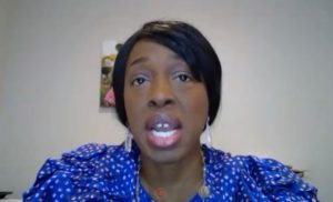 Illinois Department of Public Health Director Dr. Ngozi Ezike speaks from her home via video during a Monday, May 11, news conference updating the state's response to the COVID-19 pandemic. The daily news conference is now being done via video conference as Gov. JB Pritzker  and senior staff are now working from home because a staffer has tested positive for COVID-19. (Credit: blueroomstream.com)
