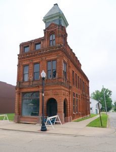The Virginia City Council Monday night approved the use of TIF money to clean up the old bank building site on the Virginia Square.  The old bank has been empty for years, has fallen into disrepair and now represents a hazard to pedestrians using the sidewalk.  (Photo by Brian DeLoche.)