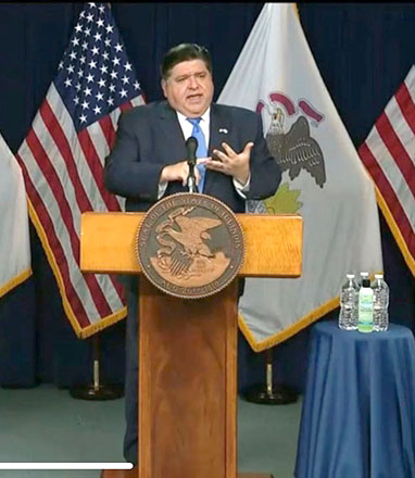 Gov. JB Pritzker responds to questions from the news media during a COVID-19 briefing in Chicago Wednesday in which he announced new guidelines drastically limiting the allowable competition in youth sports. (Credit: BlueRoomStream.com)