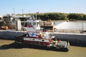 Just passin’ through — The Motor Vessel Thomas Kennedy was the first boat to transit the lock chamber at the LaGrange Lock and Dam on the Illinois River. (Photo by Brian DeLoche)