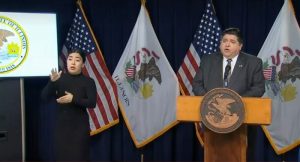 Gov. JB Pritzker talks to reporters at his daily COVID-19 briefing Wednesday in Chicago. (Credit: Blueroomstream.com)