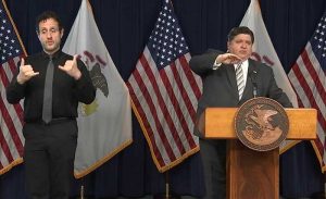 Gov. JB Pritzker tells reporters during a news conference Monday in Chicago that the COVID-19  situation in the northwest region of Illinois is impacted by sharing borders with Iowa and Wisconsin, states where positivity rates are higher. (Credit: facebook.com)