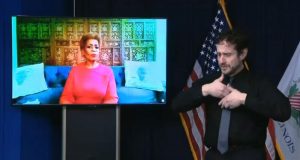 Bonnie Blue, a Chicago resident who took part in a clinical trial of a COVID-19 vaccine, speaks via videoconference during Gov. JB Pritzker's daily media briefing Tuesday to encourage everyone to take the vaccine once it becomes available. (Credit: Blueroomstream.com)