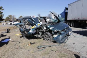 Pictured is the wreckage of the Dodge Caravan driven by Christopher Stoneking on Feb. 17, 2017, when it collided with the back of a semi-tractor trailer truck stopped in traffic as it waited to turn into the JBS parking lot.