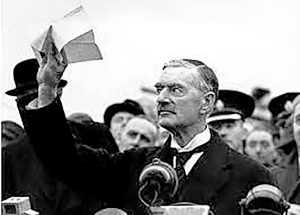 British Prime Minister Neville Chamberlain upon returning from the now infamous Munich Conference of 1938.