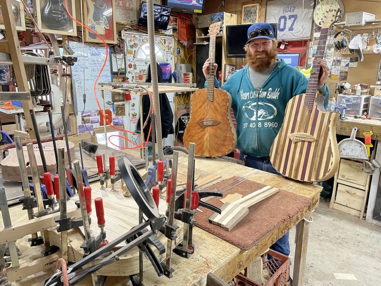 Hoar shows off some examples of his work.