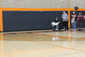 Senior band member Rey Barralaga is recognized on Senior Night