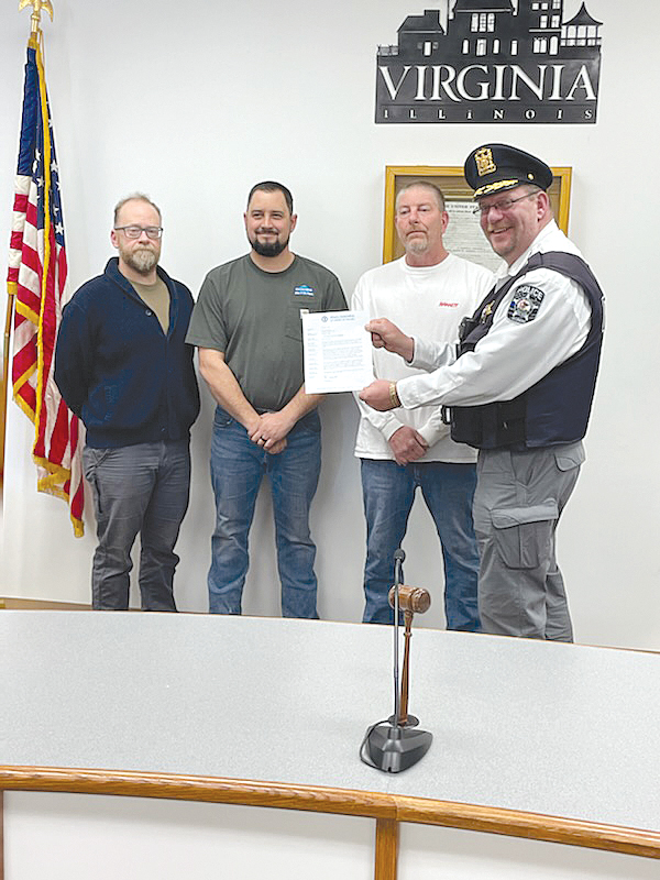Virginia Police Chief presents Federal Use of Force Certification to city aldermen From left to right are Jason Friche, Tommy Knouse, Brad Bowman, and Chief of Police Daniel W Smith. Photo by Steven Miller