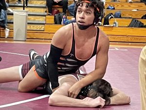 Jonny Marquez looks up after scoring a takedown.