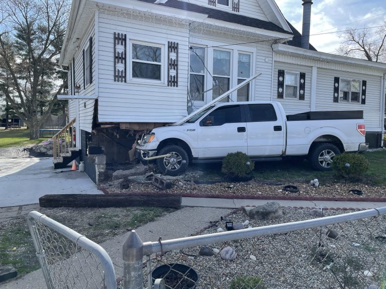 Truck in wall