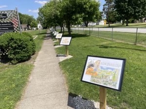 Families in the Ashland area can enjoy a new “Story Walk” in James Park in Ashland. The walk is in honor of former librarian Liz Walbaum. The walk was developed by the Prairie Skies Public Library District through a grant from the Tracy Foundation and memorial funds.  		  Photo by Bill Mitchell.