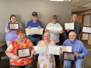 Pictured above are the staff of the Cass County Star-Gazette holding the many many awards from the IPA . Picture in front, left to right, Sally Lael, Jaime Chapman, and Gary Loftus. Back row, left to right, Kaitlyn Copley, Allen Krohe, Jim Lincoln and Jason Brockschmidt.