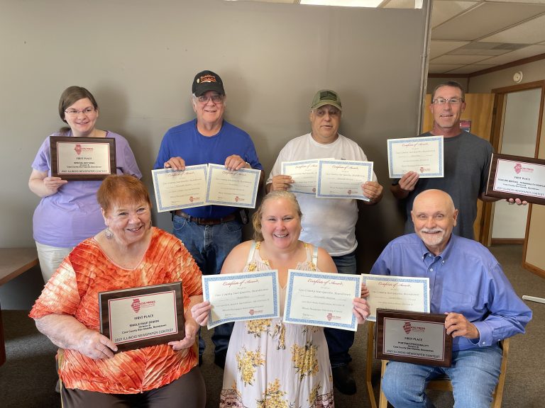 Pictured above are the staff of the Cass County Star-Gazette holding the many many awards from the IPA . Picture in front, left to right, Sally Lael, Jaime Chapman, and Gary Loftus. Back row, left to right, Kaitlyn Copley, Allen Krohe, Jim Lincoln and Jason Brockschmidt.