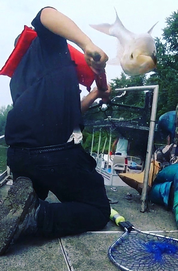An invasive Asian Carp makes an appearance during the 2021 Redneck Fishing Tournament. More than 2,800 of the invasive fish were caught during the 2021 tournament.