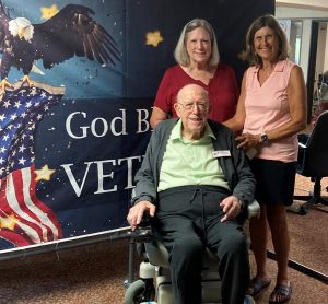 Roy Roberts with daughters Ann Chelette (left) and Sue Walker (right)