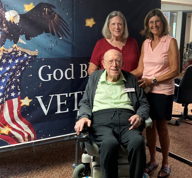 Roy Roberts with daughters Ann Chelette (left) and Sue Walker (right)