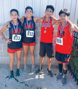 Pictured are high school and middle school Tiger Cross Country medal winners from the PORTA Invite (L/R): Diana Huerta (H.S.), Daisy Gil (H.S.) Martin Pineda (M.S.) and Bryan Islas (H.S.).