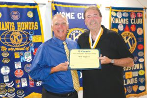 Jack Fearneyhough presents  Steve Megginson with the Luis V. Amadon Medallion Award.