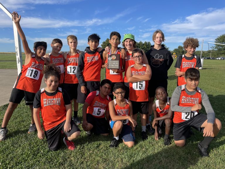Beardstown Middle School Boys Cross Country team are pictured with their plaque for winning first place at the Big 5 Conference Meet.