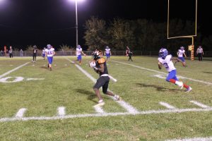 Senior Lucas Domitien is wide open and makes the catch in the Tigers senior night win over Pleasant Hill. Photo by Jason Brockschmidt