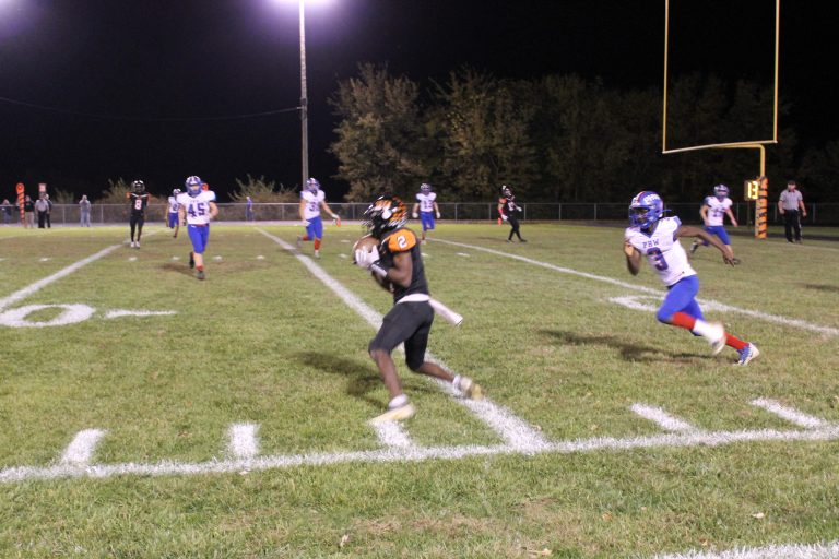 Senior Lucas Domitien is wide open and makes the catch in the Tigers senior night win over Pleasant Hill. Photo by Jason Brockschmidt
