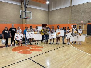 The 2022 Beardstown Tiger’s 8th grade basketball team and families are pictured. (L/R) Stella Petersen, Eileen Perez, Ashley Martinez, Marielis Perez, Essivi Eyram Benedicte Sogah, Estefania Juarez, Laetitia Kanda and Jenny Bongo.