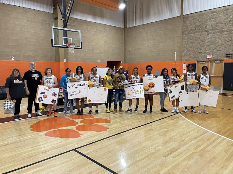 The 2022 Beardstown Tiger’s 8th grade basketball team and families are pictured. (L/R) Stella Petersen, Eileen Perez, Ashley Martinez, Marielis Perez, Essivi Eyram Benedicte Sogah, Estefania Juarez, Laetitia Kanda and Jenny Bongo.