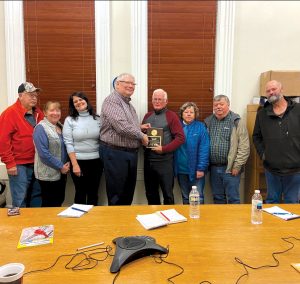 Shown from left are Gary Noe, Connie Starkey, Kim Hance, Mike Barnett, Charles Hagloch, Ramona Douglass, Bill Merriman, Roger Lauder. Photo submitted.