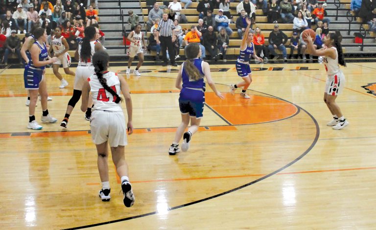 Senior Genesis Perales launches the three pointer in the Lady Tigers win over North Greene.  The girls and boys teams both won over the Spartans in a double dip.