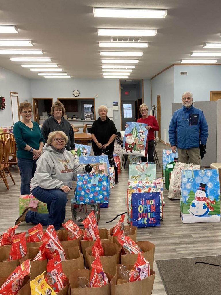 Shown from left standing are Brenda Fishel, Carole Robeson, Christy Nordsiek, Marti Fearneyhough and Steve Daniel, Emblem Club President. Kneeling in front is Beth Miller.