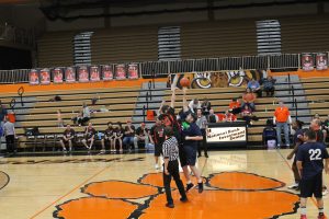 The opening tip goes to BASA Black Attack in a game against the SOAR Falcons in the Beardstown Area Special Athletes Mile 88 Hoops Classic. 