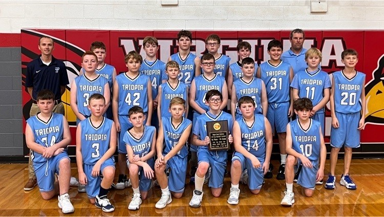 Pictured is the Triopia 7th Grade Basketball team with their plaque for placing 3rd in the Virginia Holiday Tournament.