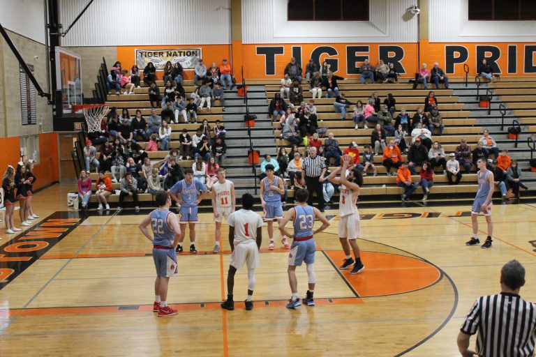 Owen Quigley shoots a free throw during varsity basketball action against Lewistown.