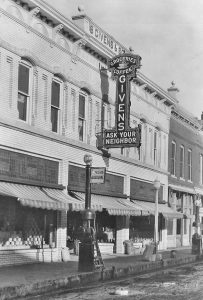 Givens Brothers store in Mt. Sterling. The electrified outdoor sign was a marvel of the day.(CIPS photo, Leigh Morris collection)