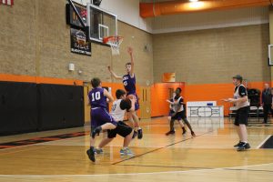 Tiger Tucker Sorrells gets a Rocket in the air with a ball fake before dishing to Kaden Pilger who hit the bucket from the elbow in 6th grade hoops action.