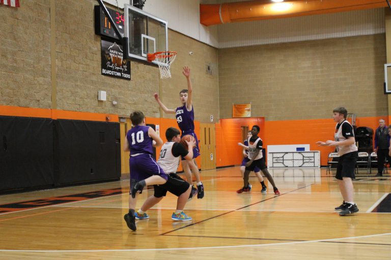 Tiger Tucker Sorrells gets a Rocket in the air with a ball fake before dishing to Kaden Pilger who hit the bucket from the elbow in 6th grade hoops action.
