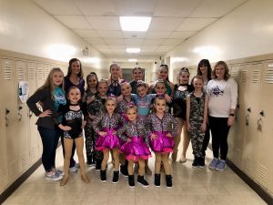 Dancers are shown front row, left to right: Ellie Jones, Brynlee Evans, Makinlee Harrison. Middle row: Anlee Jones, Ella Rigg, Finnley Cook, Izzy Claudius, Serena Graham-Martinez, Maddie East. Back row: Coach Emery Maliongas, Coach Sara Hoots, Makaylin Evans, Ainsley Hills, Yasmin Lopez, Ava Davis, Piper Wellenkamp, Coach Ciara Hibbs, Coach Laura Evans