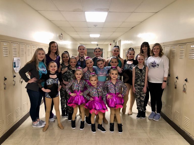 Dancers are shown front row, left to right: Ellie Jones, Brynlee Evans, Makinlee Harrison. Middle row: Anlee Jones, Ella Rigg, Finnley Cook, Izzy Claudius, Serena Graham-Martinez, Maddie East. Back row: Coach Emery Maliongas, Coach Sara Hoots, Makaylin Evans, Ainsley Hills, Yasmin Lopez, Ava Davis, Piper Wellenkamp, Coach Ciara Hibbs, Coach Laura Evans