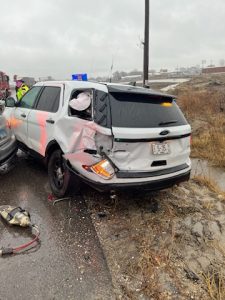 An Illinois State Police patrol car was hit in a crash involving a Beardstown man.