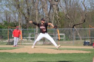 BHS pitcher Micah Wink rares back to bring the heat against West Hancock in the Tiger Showcase.