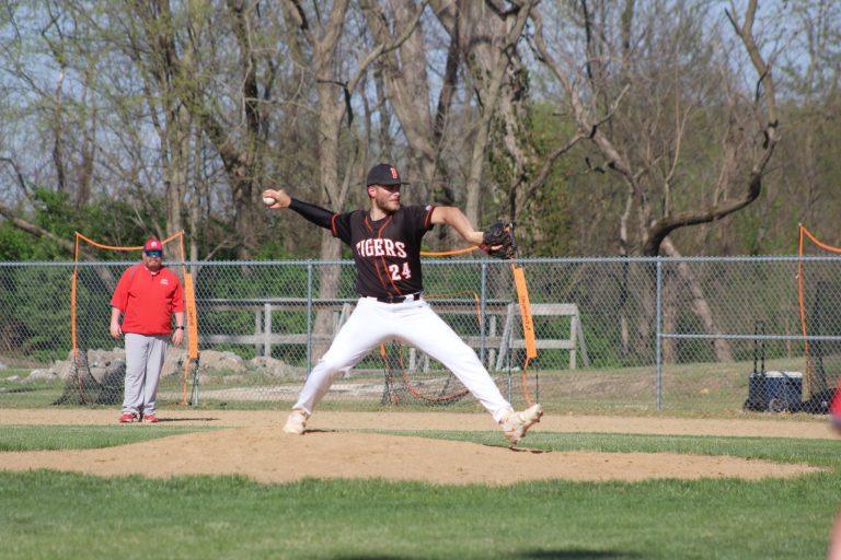 BHS pitcher Micah Wink rares back to bring the heat against West Hancock in the Tiger Showcase.
