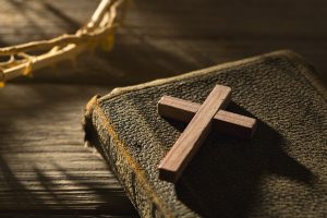 Cross on a bible