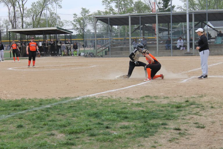 A Panther slides in safely to third as Shelby Goodrich fields the throw. Photo by Brockschmidt