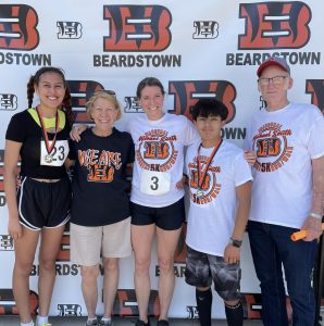 It was a beautiful morning for The Inaugural Michael Smith Memorial 5K hosted by the BHS National Honor Society to benefit BHS students with scholarships.  Pictured with the winners are some of former Superintendent Michael Smith’s family (L/R): Camila Garcia (female winner), Nancy Brachbill (mother-in-law), Shannon Smith (wife), Bryan Islas Vazquez, and Neil Smith (dad).
