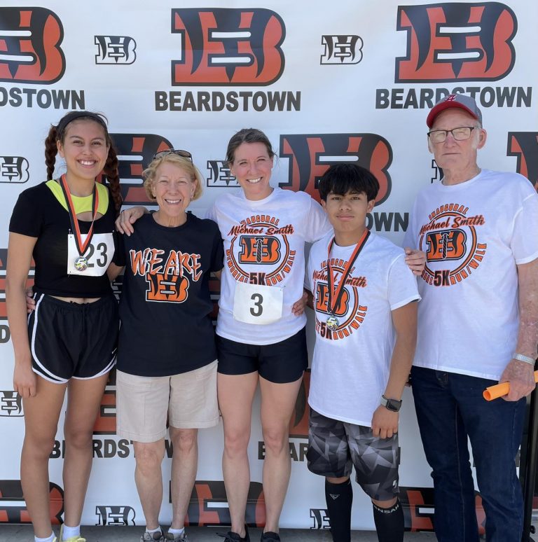 It was a beautiful morning for The Inaugural Michael Smith Memorial 5K hosted by the BHS National Honor Society to benefit BHS students with scholarships.  Pictured with the winners are some of former Superintendent Michael Smith’s family (L/R): Camila Garcia (female winner), Nancy Brachbill (mother-in-law), Shannon Smith (wife), Bryan Islas Vazquez, and Neil Smith (dad).