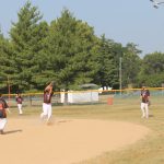 The Beardstown Area Special Athletes Black Attack shortstop makes the over the shoulder catch.